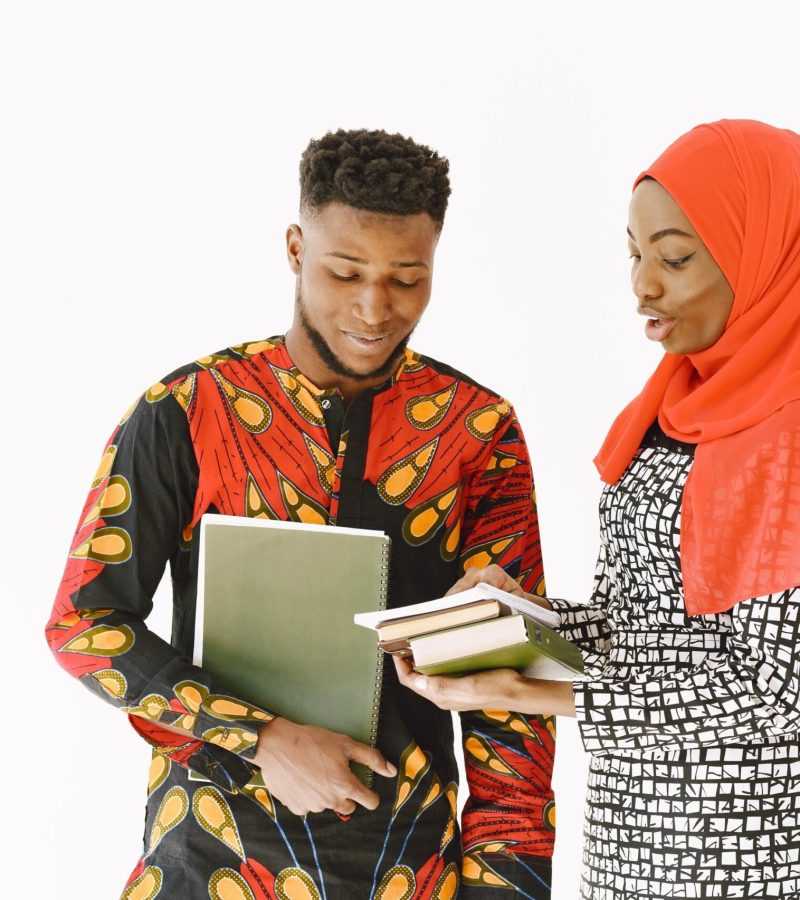 african-students-in-traditional-clothes-with-book-2026-03-17-14-27-01-utc (1) (1)